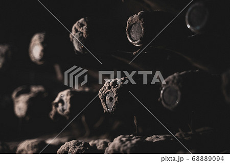 aged wine bottles covered with mold in vintage aged wine bottles covered with mold in vintage 68889094