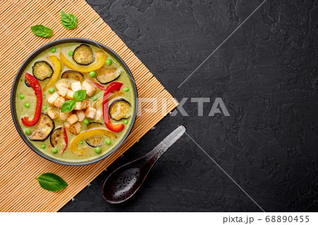 Vegetarian Thai Green Curry with tofu in black bowl Vegetarian Thai Green Curry with tofu in black bowl 68890455