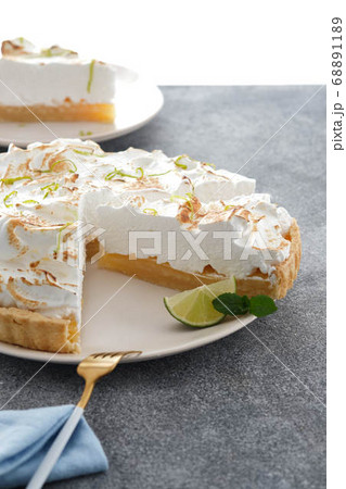 Homemade baked lemon tart cake with meringue cream. Copy space. Homemade baked lemon tart cake with meringue cream. Copy space. 68891189
