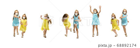 Happy little caucasian kids jumping and running isolated on white background 68892174