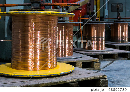 Production of copper wire, bronze cable in reels at factory Production of copper wire, bronze cable in reels at factory 68892789