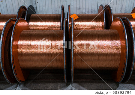 Production of copper wire, bronze cable in reels at factory Production of copper wire, bronze cable in reels at factory 68892794
