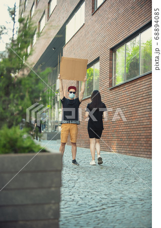 Dude with sign - man stands protesting things that annoy him Dude with sign - man stands protesting things that annoy him 68894085