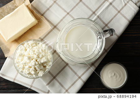 Fresh dairy products and towel on wooden 68894194