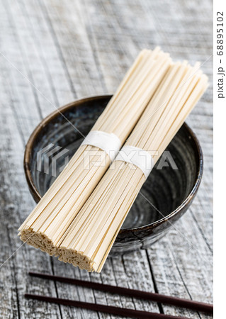 Uncooked udon noodles. Traditional Japanese 68895102