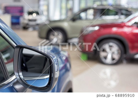 New cars at dealer showroom.Themed blur background 68895910