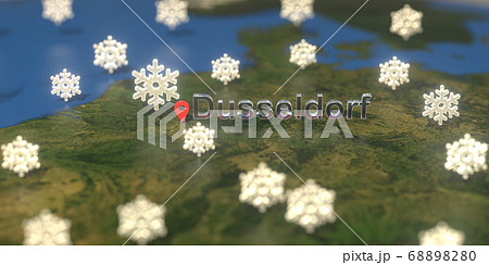 Snowy weather icons near Dusseldorf city on the map, weather forecast related 3D rendering Snowy weather icons near Dusseldorf city on the map, weather forecast related 3D rendering 68898280