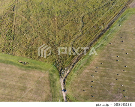 rolls of hay on the field aerial photo rolls of hay on the field aerial photo 68898338