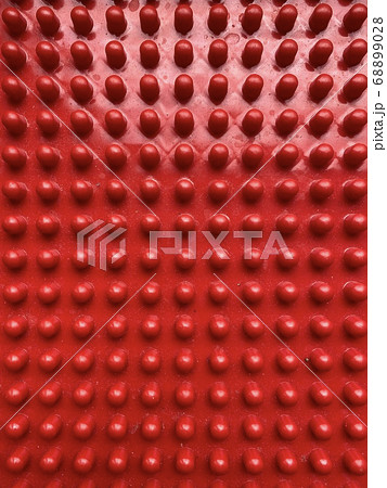 Texture,of red plastic with pimples close up, abstract background Texture,of red plastic with pimples close up, abstract background 68899028