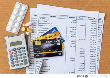 Medicine and calculator on Bank statement and 68906865