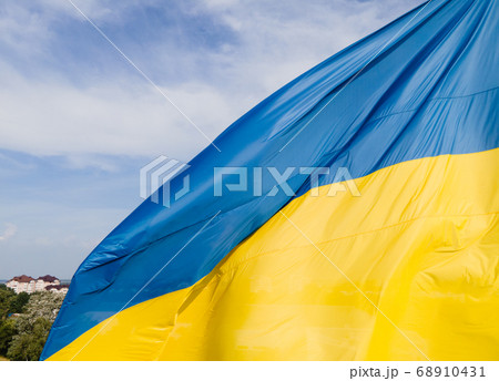 National flag of Ukraine by day. Kyiv aerial 68910431