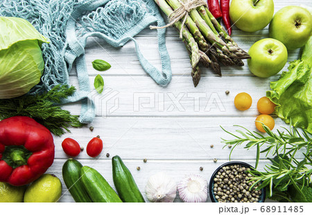 Fresh vegetables and fruits with a string bag 68911485