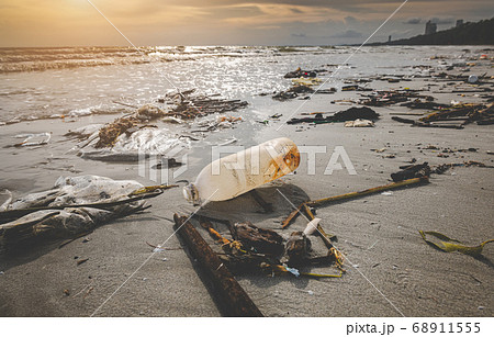 Plastic bottle garbage on the beach. 68911555