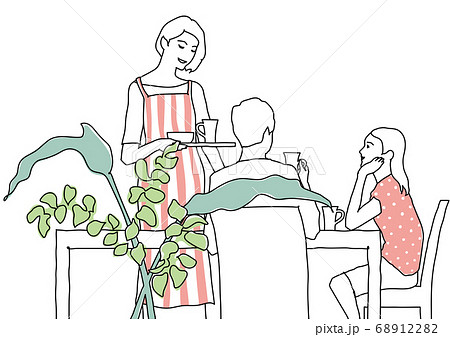 テーブルでお茶を飲む3人家族 68912282