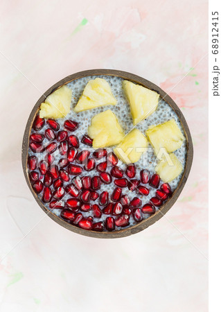 Chia seed pudding, mango and pomegranate in a bowl Chia seed pudding, mango and pomegranate in a bowl 68912415