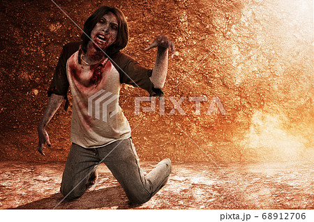 Scary zombie with blood and wound on his body crawling on the floor 68912706