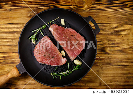 Raw pork steaks ready for preparation 68922054