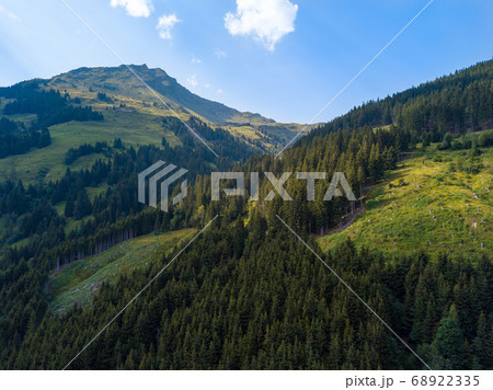 Aerial view into the valley head of the Hinterglemm Mountains on a summer day in the Alps at Saalbach-Hinterglemm, Austria 68922335
