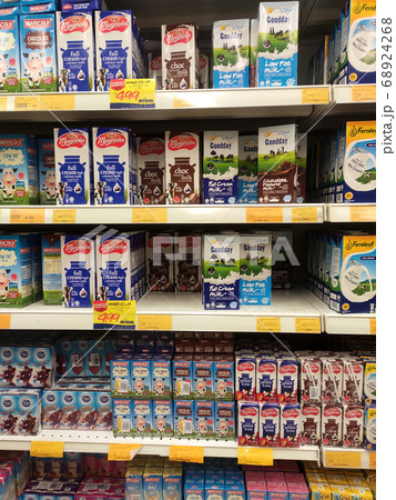 SEREMBAN, MALAYSIA -JULY 5, 2019: Processed and fresh milk packed in the paper box and displayed on the rack inside the supermarkets. Sorted by brand and type for easy for the customer to choose. SEREMBAN, MALAYSIA -JULY 5, 2019: Processed and fresh milk packed in the paper box and displayed on the rack inside the supermarkets. Sorted by brand and type for easy for the customer to choose. 68924268