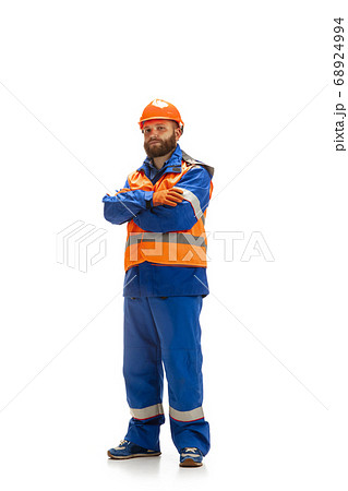 Handsome contractor, builder isolated over white studio background Handsome contractor, builder isolated over white studio background 68924994