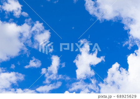 White fluffy clouds in the blue sky White fluffy clouds in the blue sky 68925629