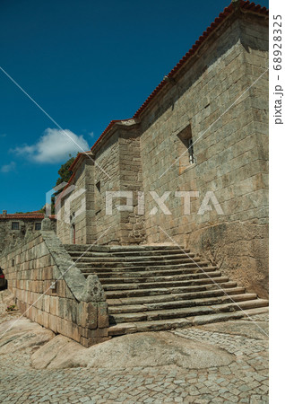 Gothic house made of stone with staircase 68928325