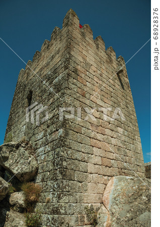 Square tower made of stone in a castle Square tower made of stone in a castle 68928376