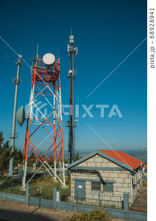 Telecommunication towers on a base transceiver station Telecommunication towers on a base transceiver station 68928941