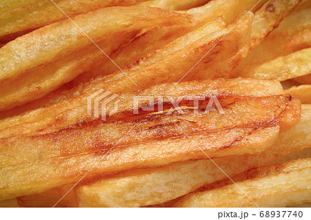 French fries fried in oil. Unhealthy nutrition 68937740