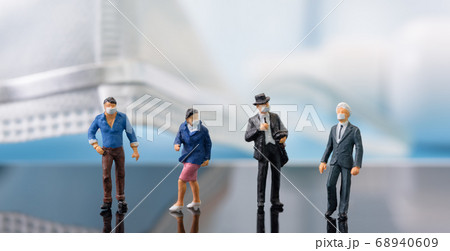 Social distancing,Miniture business people wear Social distancing,Miniture business people wear 68940609