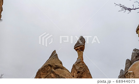 Fairy Chimneys at Pasabag, the valley of the monks in Goreme. Rock Formations with multihead stone mushroom fairy chimneys in Pasabag, Cappadocia, Turkey 68944075