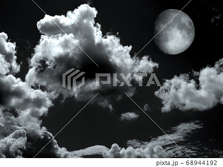 The moon in the night sky 68944192