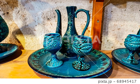 Colorful handmade traditional anatolian souvenirs at the pottery shop in Avanos, Cappadocia 68945417