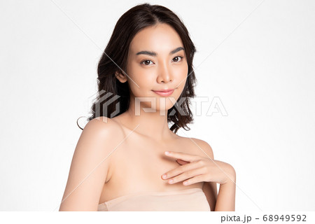 Beautiful Young asian Woman with Clean Fresh Skin, on white background, Face care, Facial treatment. Beautiful Young asian Woman with Clean Fresh Skin, on white background, Face care, Facial treatment. 68949592