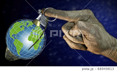 Globe in the form of a grenade. Human hand pulling Globe in the form of a grenade. Human hand pulling 68949813