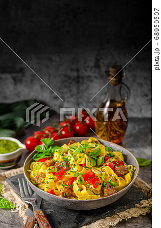 Chinese noodles with pork meat and herbs 68950507