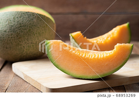 Fresh sliced japanese melon on wood table 68953269