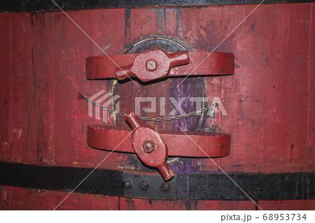 Maintenance hatch in an old wood storage tank 68953734