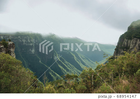 Fortaleza Canyon with rocky cliffs on foggy day 68954147