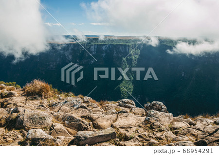 Fortaleza Canyon with steep rocky cliffs and mist Fortaleza Canyon with steep rocky cliffs and mist 68954291