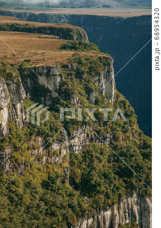 Fortaleza Canyon with steep cliffs and waterfall Fortaleza Canyon with steep cliffs and waterfall 68954320