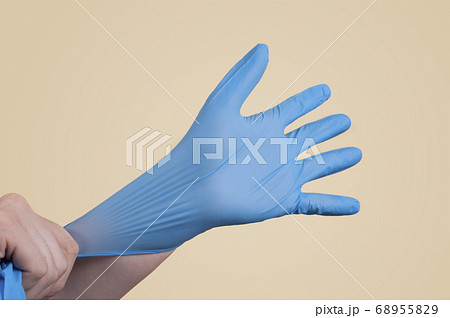 Medical gloves on hands. 68955829