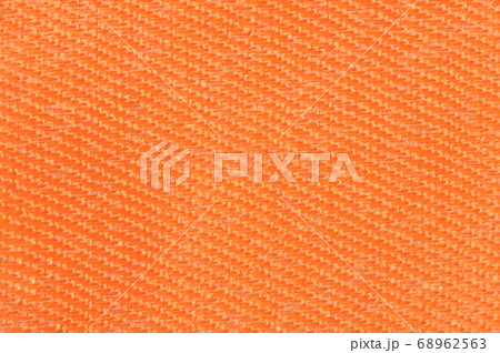 Orange canvas fabric texture background. Textile Orange canvas fabric texture background. Textile 68962563