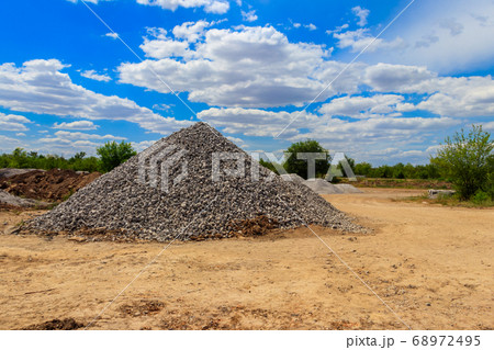 Piles of gravel for road construction 68972495