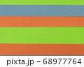 Green, Orange and Blue coloured paper background 68977764