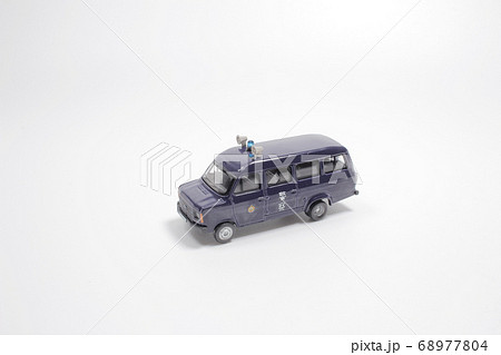 Scale police car model with figure at the white Scale police car model with figure at the white 68977804