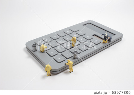 a mini people worker figures checking the 68977806