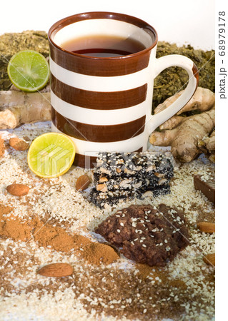 cup of tea with ingredients for tea 68979178