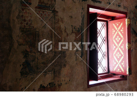 :Detail image of ancient vindow and mural painting is located in Wat Phumin :Detail image of ancient vindow and mural painting is located in Wat Phumin 68980293