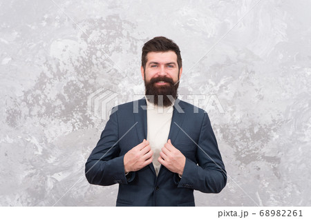 Menswear and fashion concept. Man handsome bearded 68982261